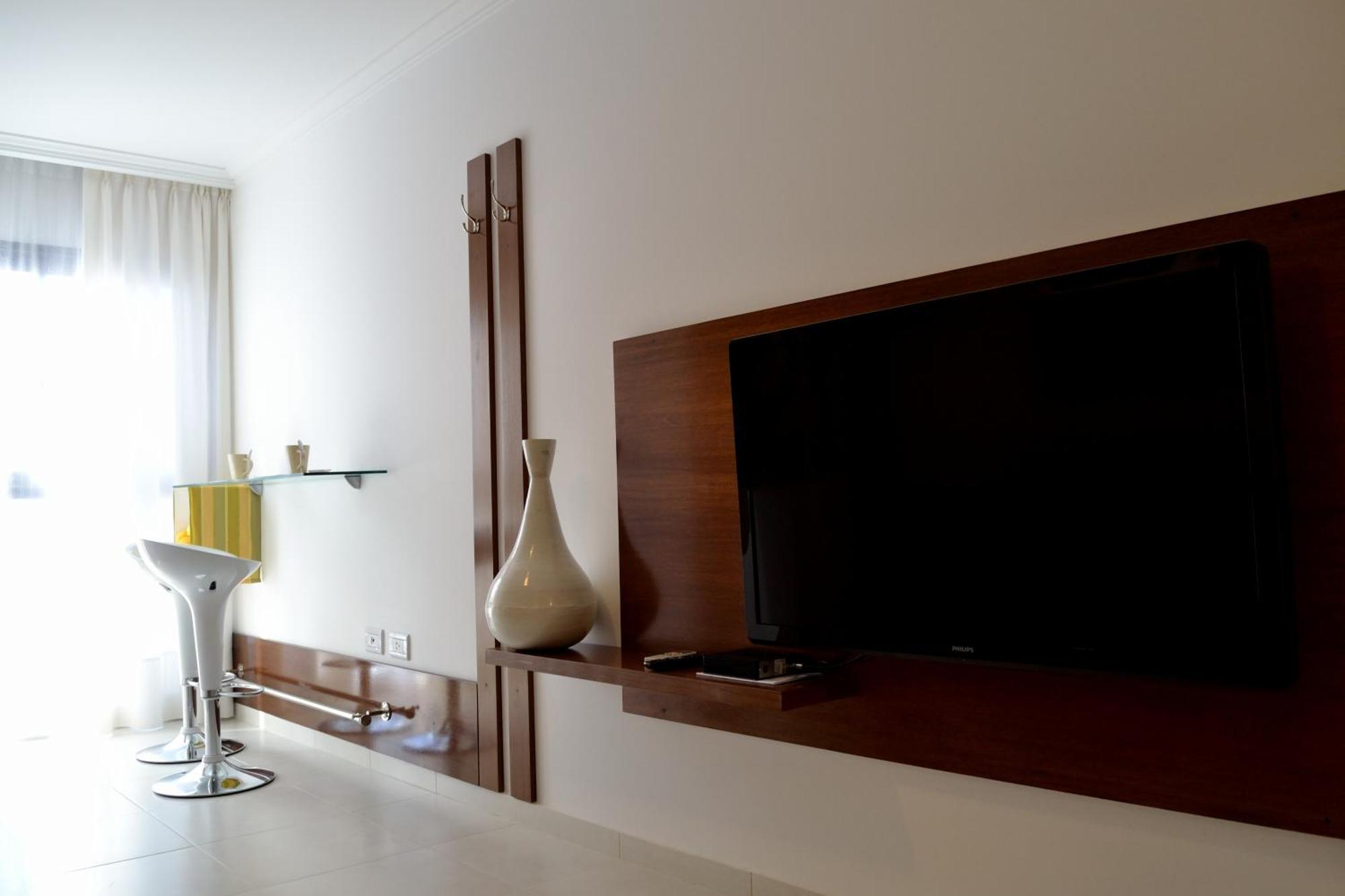 At Suites Córdoba Habitación foto