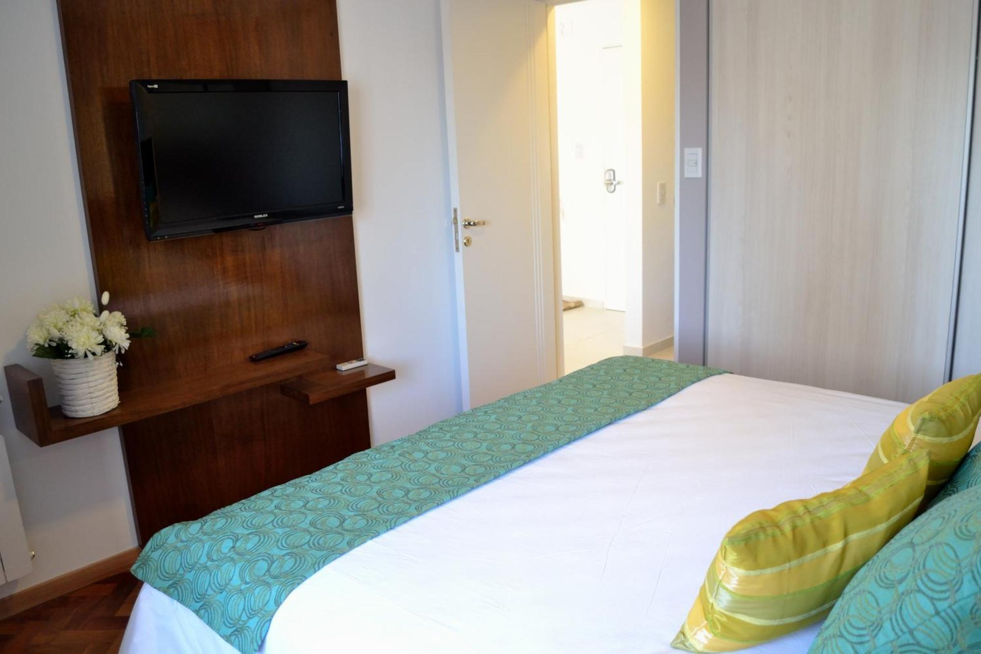 At Suites Córdoba Habitación foto